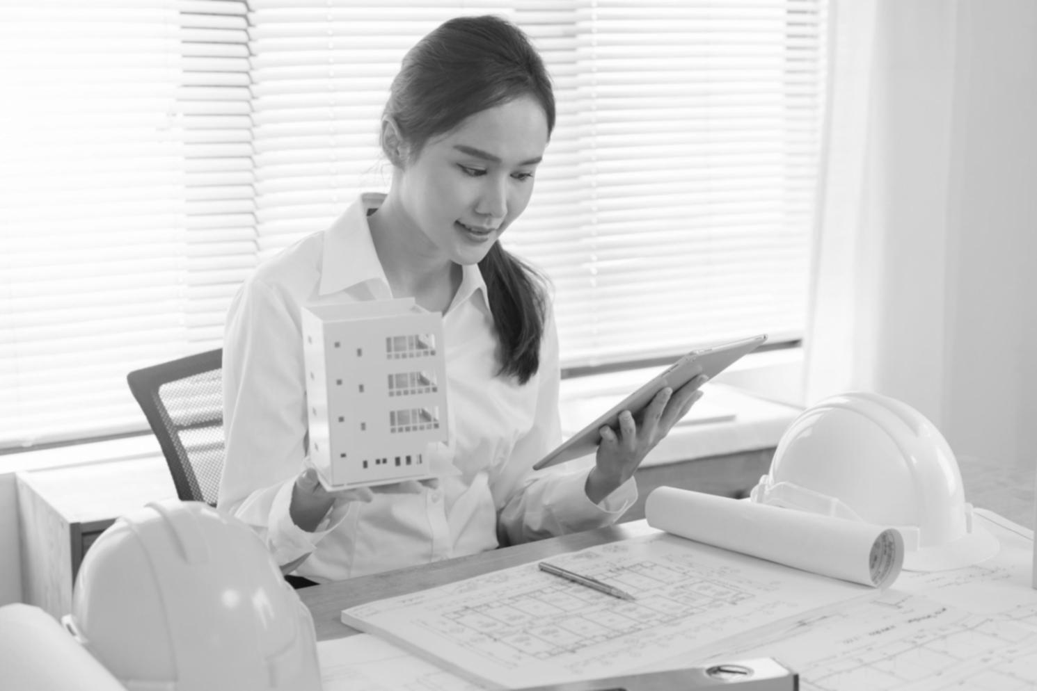 Instructor explaining financial ratios on whiteboard